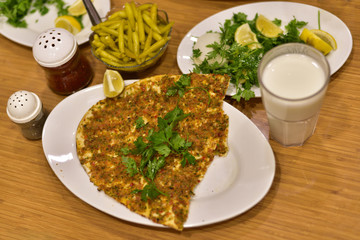 Turkish pizza  in a famous local restaurant in Gaziantep, Turkey