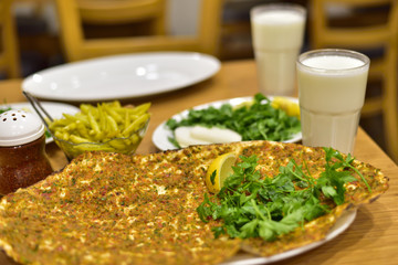 Turkish pizza  in a famous local restaurant in Gaziantep, Turkey