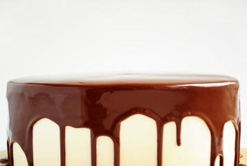 Cake with chocolate mirror glaze. Close-up. Picture for a menu or a confectionery catalog.