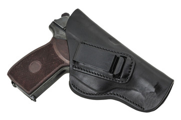 Molded leather holster with handgun. Isolated