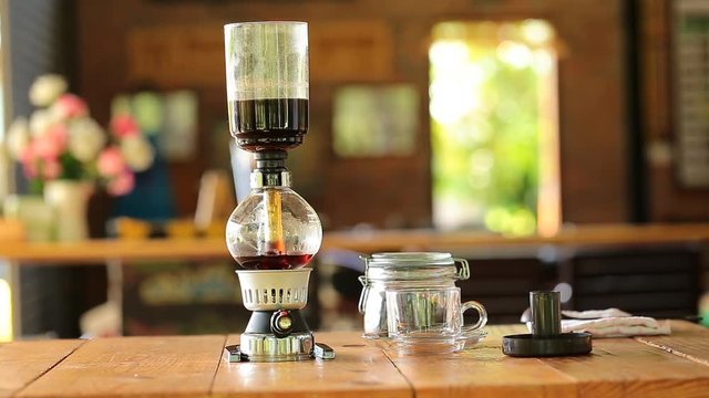 Vacuum coffee maker is also known as a vacuum pot, siphon, or syphon coffee maker. A siphon vacuum coffee maker at shop