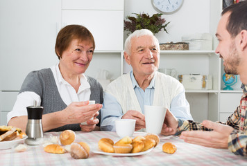 Grandparents and grandson breakfast