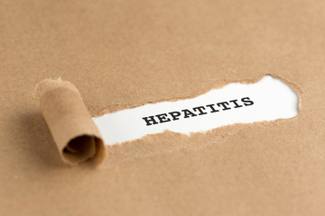 The text HEPATITIS appearing behind torn brown paper