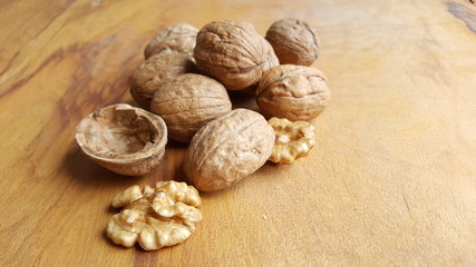 walnut on wood background