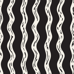 Decorative seamless pattern with handdrawn doodle lines. Hand painted grungy wavy stripes background. Trendy freehand texture