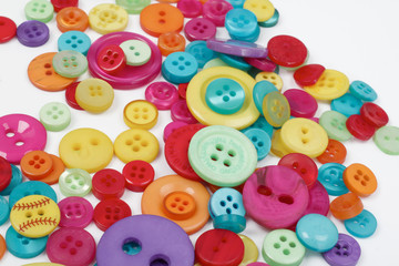 Fototapeta na wymiar Buttons for craft, loose, different colors and sizes