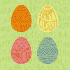 Happy Easter card with 4 eggs, square with green grass background