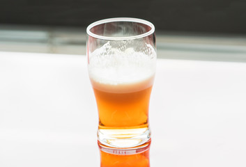 Glass of cold beer on a white background. Clipping path.