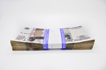 bundle of 100 pieces banknote 50 fifty rubles banknotes of Bank of Russia on white background Russian rubles