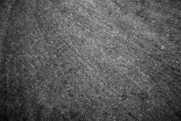 Asphalt background texture with some fine grain with road