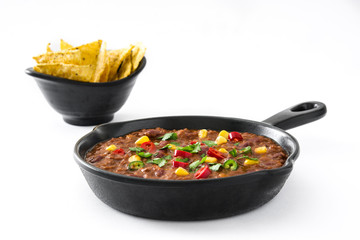 Traditional mexican tex mex chili con carne in a frying pan isolated
