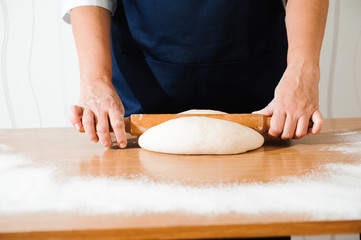 Chef preparing dough - cooking process