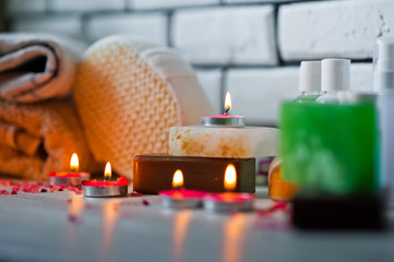 Bathroom accessories. Body care. Multi-colored natural soap, gels, shampoos, balms in vials, sea...