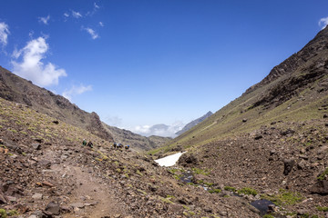 Toubkal national park, the peak whit 4,167m is the highest in the Atlas mountains and North Africa, trekking trail panoramic view.