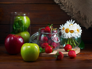 Still life with fruit on a wooden background