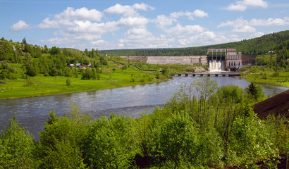 Fototapeta na wymiar Panorama of hydroelectric power station on sunny day