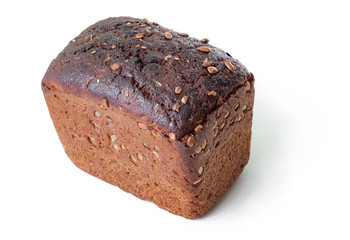 Whole wheat bread baked with seeds isolated on white