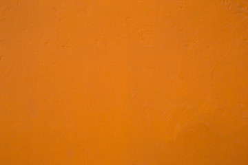 Orange wall background.