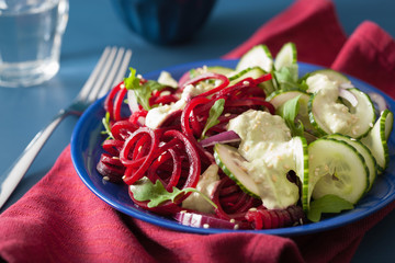 spiralized beet and cucumber salad with avocado dressing, healthy vegan meal