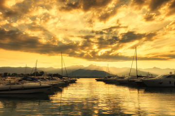 Obraz na płótnie Canvas sunset on the harbor, Bocca di Magra, La Spezia, Italy