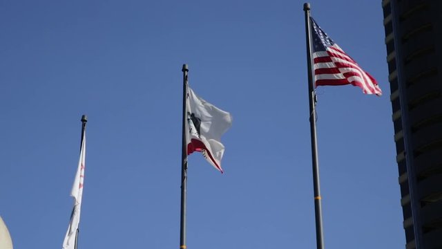 USA flying flag, California state flying flag