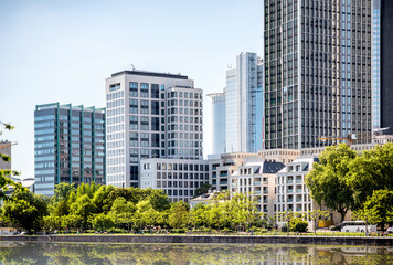 View on the financial district with Main river in Frankfurt city, Germany