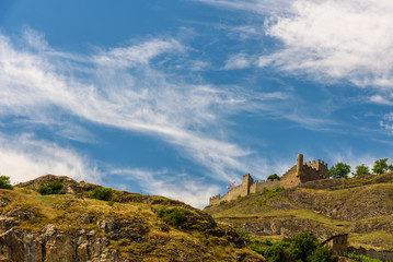 Fototapeta na wymiar Ruins of a castle in Switzerland against blue sky