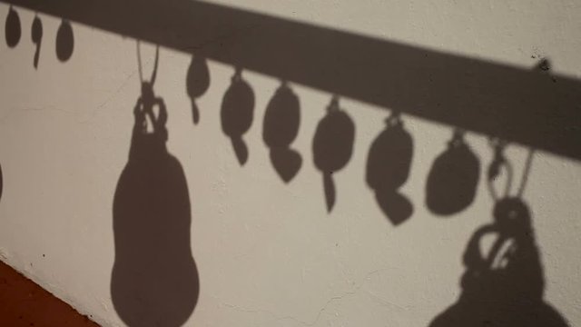 Shadows of sacral bells in Wat Saket Ratcha Wora Maha Wihan (the Golden Mount). Bangkok Thailand.