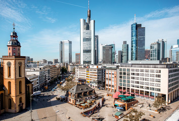 View on the Hauptwache square with old church and skyscrapers in Frankfurt city