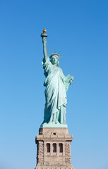 Fototapeta premium Statue of Liberty with pedestal in New York, clear blue sky in a sunny day, clipping path