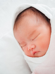 Newborn baby girl sleeping