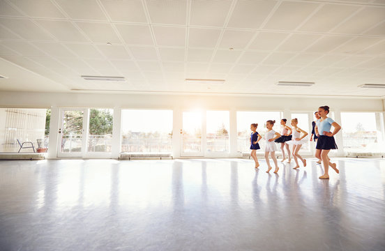 Group of children ballerinas practicing in ballet class
