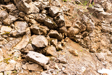 Stone cliffs in the mountains as a background