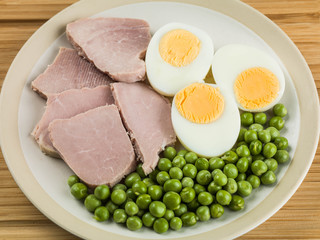 Cooked Ham and Egg Salad With Green Garden Peas