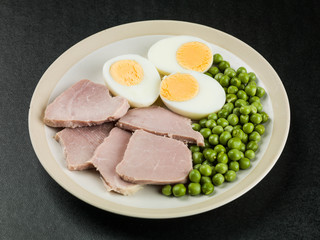 Cooked Ham and Egg Salad With Green Garden Peas