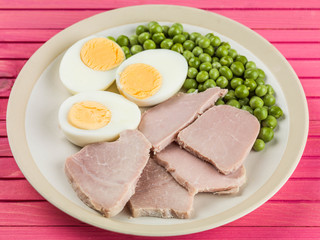 Cooked Ham and Egg Salad With Green Garden Peas