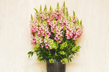 Fototapeta na wymiar Big beautiful bouquet with green hydrangea and purple sweet pea flowers
