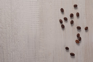 coffee beans on wooden table, top view,