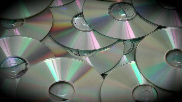 Compact Optical cd or Dvds Disks Rotating Slowly