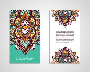 Indian style flyer with bright colorful ornament. Front and back pages. Ornamental vertical blank with ethnic motifs. Oriental design concept. EPS 10 vector illustration. Clipping masks. 
