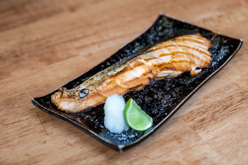 Grill Salmon fish Japanese food style with lemon 