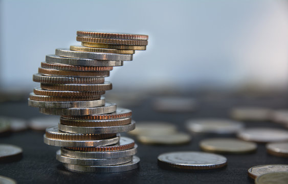 Closeup stack coin with blur background. Financial and saving concept.