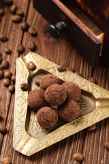 Truffle chocolate candies with cocoa powder