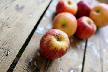 Apples on a wooden background.