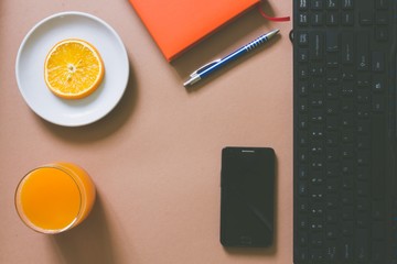 Top view of blank frame on pastel. Colored background office desk with different objects. Minimal flat lay style