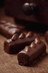 Luxury handmade candies on wooden background