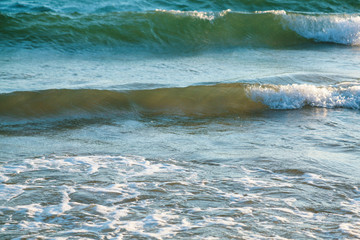 ocean surf on beach Praia Falesia near Albufeira