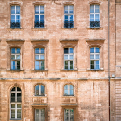 Fototapeta na wymiar wall of apartment house in Marseilles city