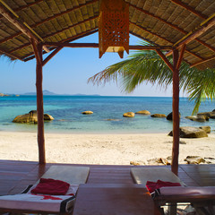 Naklejka na ściany i meble Landscape photo of tranquil Samui island beach resort from water bungalow