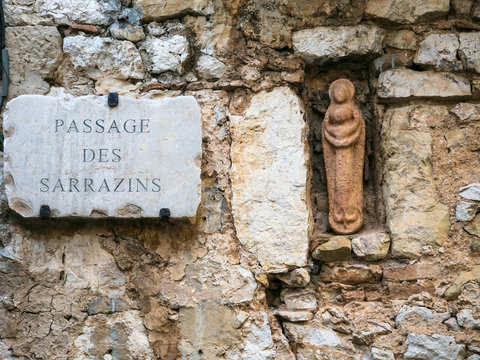 Virgin figurine in wall of medieval house